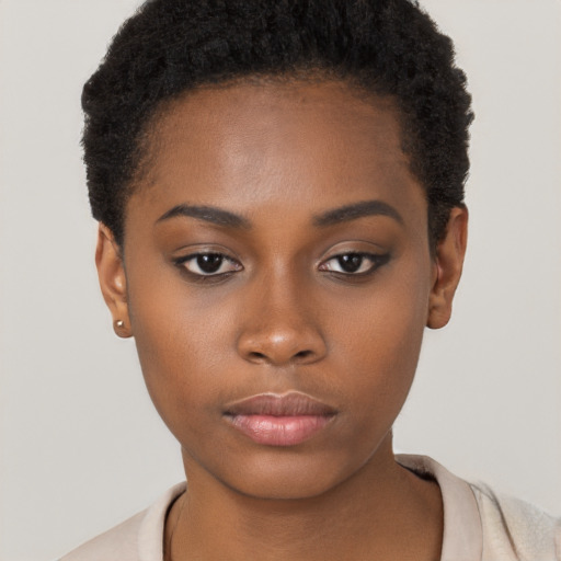 Neutral black young-adult female with short  black hair and brown eyes