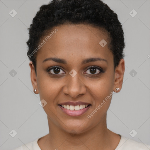 Joyful black young-adult female with short  brown hair and brown eyes