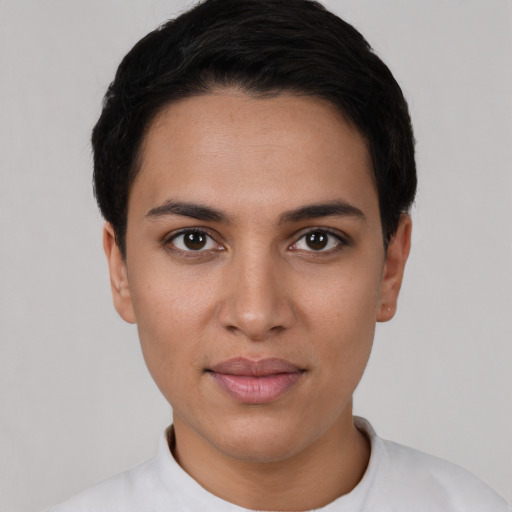 Joyful white young-adult female with short  black hair and brown eyes