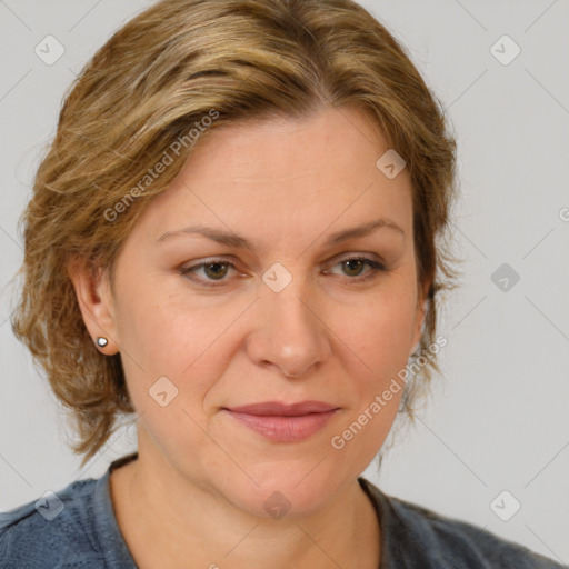 Joyful white adult female with medium  brown hair and blue eyes