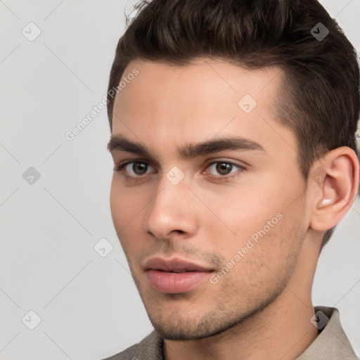 Neutral white young-adult male with short  brown hair and brown eyes