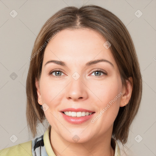 Joyful white young-adult female with medium  brown hair and brown eyes