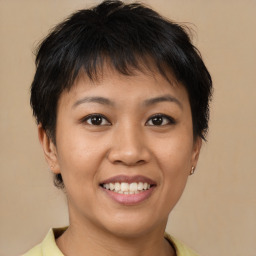 Joyful asian young-adult female with short  brown hair and brown eyes