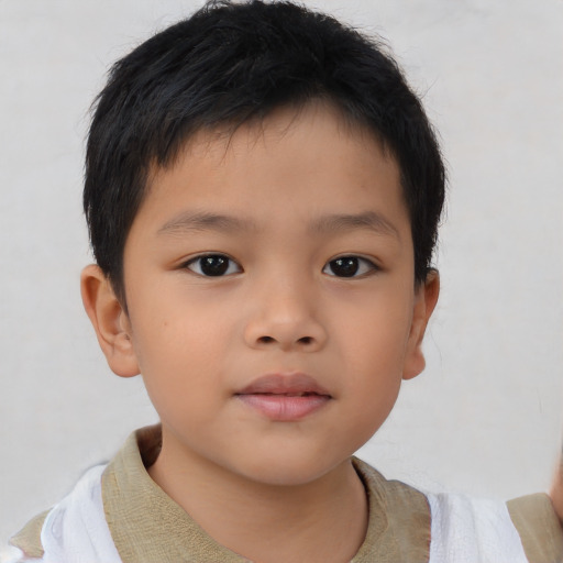 Neutral asian child male with short  brown hair and brown eyes