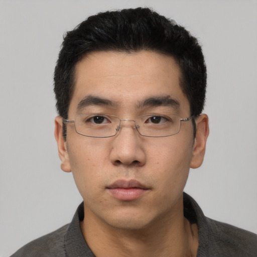 Neutral asian young-adult male with short  black hair and brown eyes
