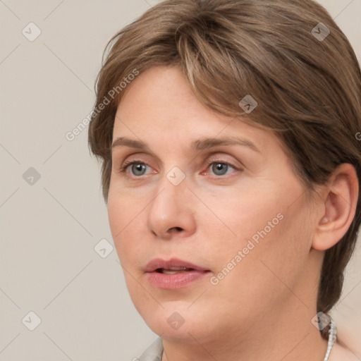 Neutral white young-adult female with medium  brown hair and grey eyes