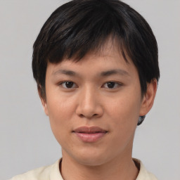 Joyful asian young-adult female with short  brown hair and brown eyes