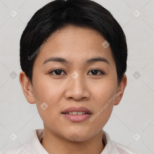 Joyful asian young-adult female with short  black hair and brown eyes