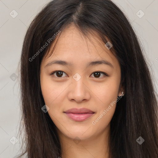 Joyful asian young-adult female with long  brown hair and brown eyes