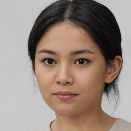 Neutral asian young-adult female with medium  brown hair and brown eyes