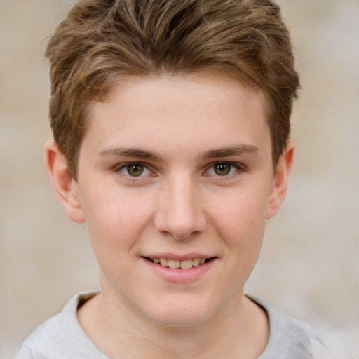 Joyful white child male with short  brown hair and brown eyes