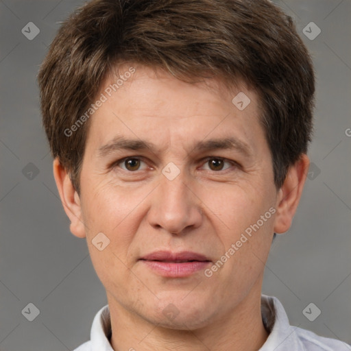 Joyful white adult male with short  brown hair and brown eyes