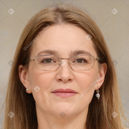 Joyful white adult female with long  brown hair and brown eyes