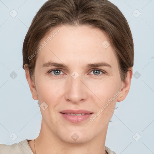 Joyful white young-adult female with short  brown hair and grey eyes