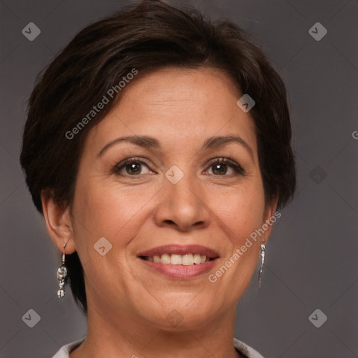 Joyful white adult female with short  brown hair and brown eyes