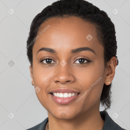 Joyful latino young-adult female with short  black hair and brown eyes