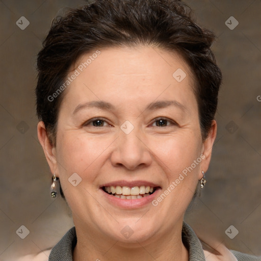 Joyful white adult female with short  brown hair and brown eyes