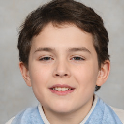 Joyful white child male with short  brown hair and brown eyes