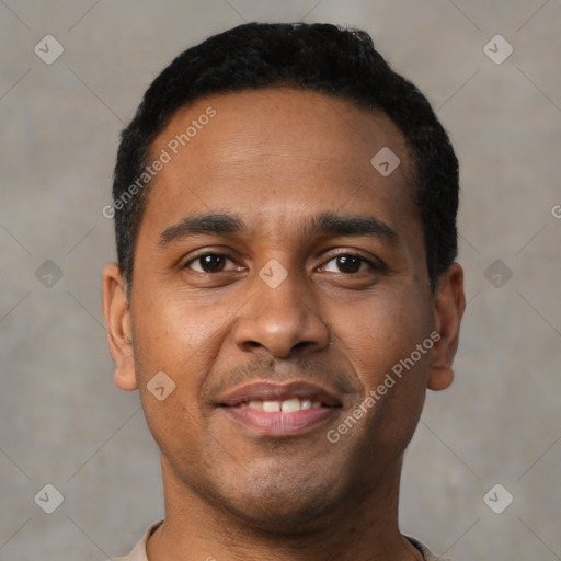 Joyful black young-adult male with short  black hair and brown eyes