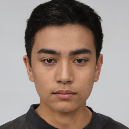 Neutral asian young-adult male with short  black hair and brown eyes