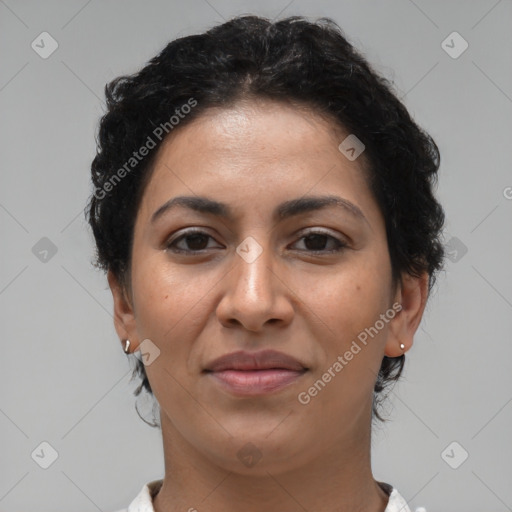 Joyful latino young-adult female with short  brown hair and brown eyes