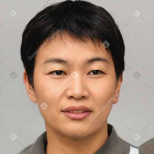 Joyful asian young-adult male with short  brown hair and brown eyes