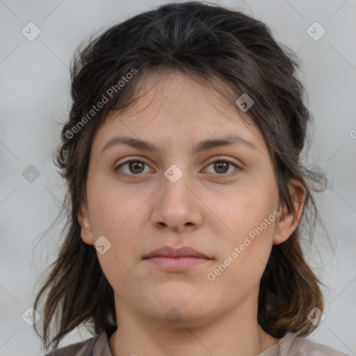 Neutral white young-adult female with medium  brown hair and brown eyes