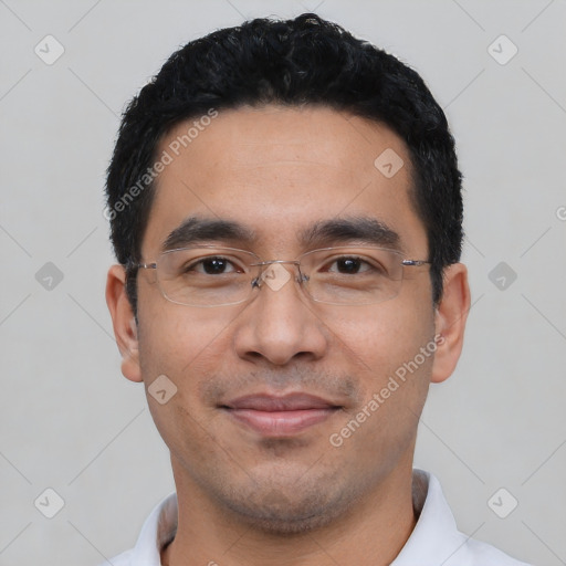 Joyful asian young-adult male with short  black hair and brown eyes