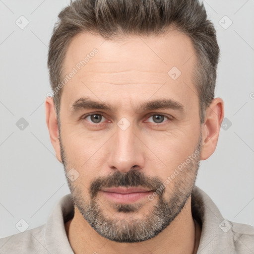 Neutral white adult male with short  brown hair and brown eyes