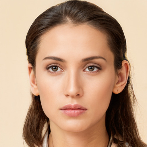 Neutral white young-adult female with long  brown hair and brown eyes