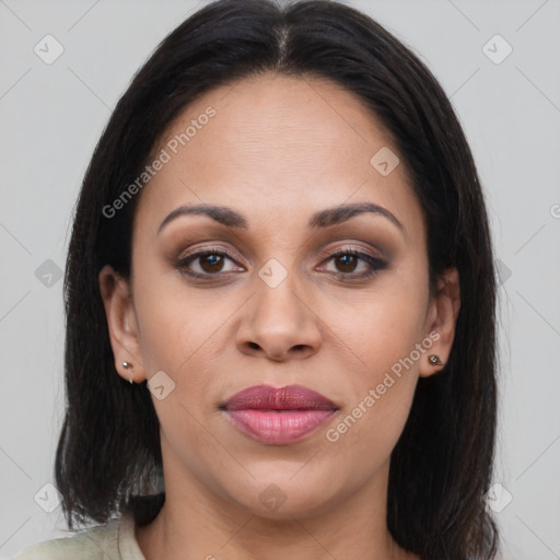 Joyful latino young-adult female with medium  brown hair and brown eyes