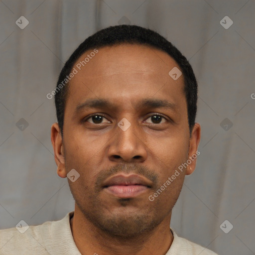 Neutral latino young-adult male with short  brown hair and brown eyes