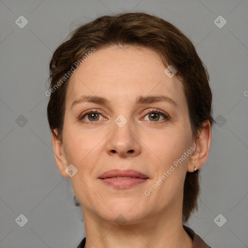 Joyful white adult female with medium  brown hair and grey eyes