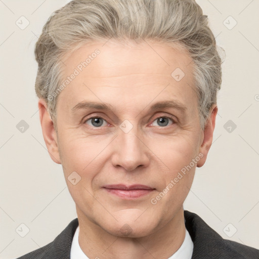 Joyful white adult male with short  brown hair and grey eyes