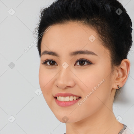 Joyful asian young-adult female with short  brown hair and brown eyes