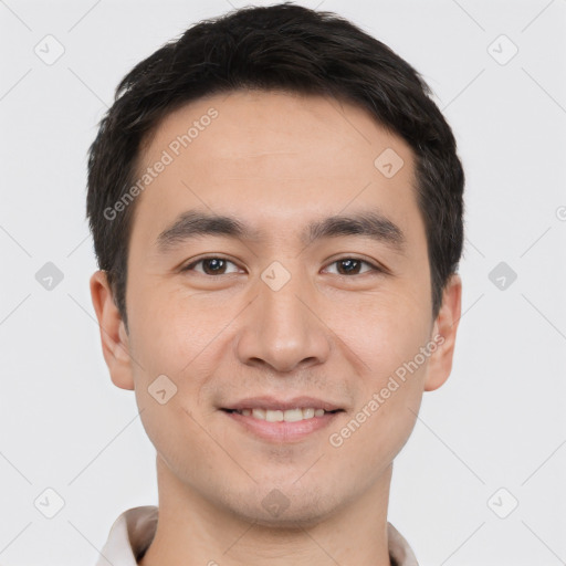 Joyful white young-adult male with short  black hair and brown eyes