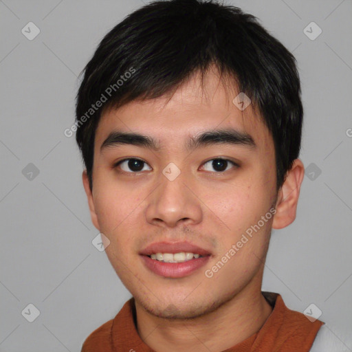 Joyful asian young-adult male with short  black hair and brown eyes