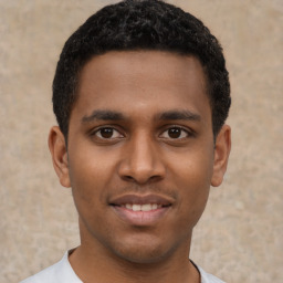 Joyful latino young-adult male with short  brown hair and brown eyes