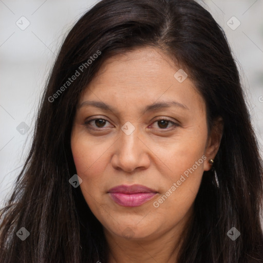 Joyful white adult female with long  brown hair and brown eyes