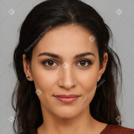 Joyful latino young-adult female with long  brown hair and brown eyes