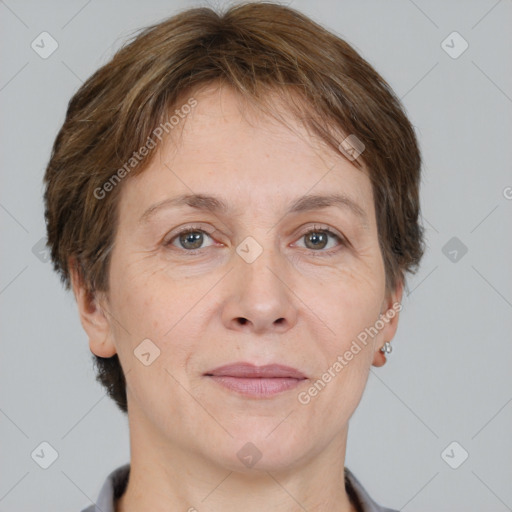 Joyful white adult female with short  brown hair and brown eyes