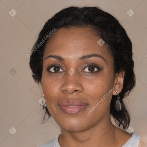 Joyful black young-adult female with medium  black hair and brown eyes