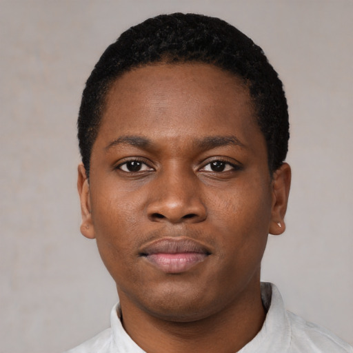 Neutral black young-adult male with short  black hair and brown eyes