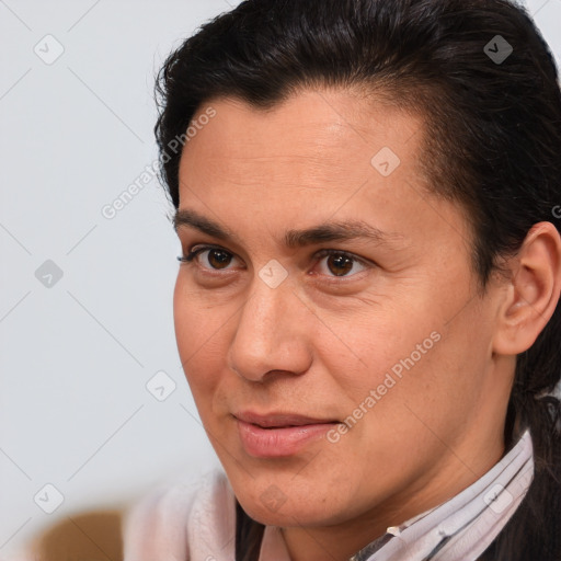 Joyful white adult male with medium  brown hair and brown eyes