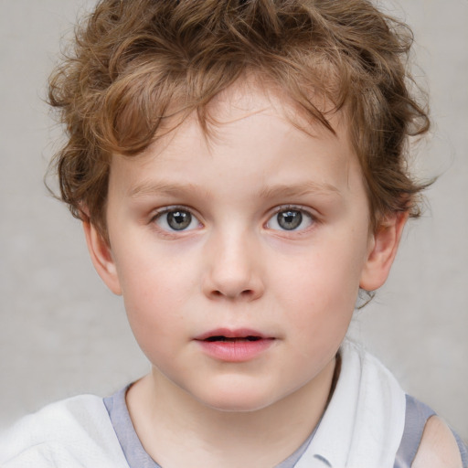 Neutral white child male with short  brown hair and blue eyes