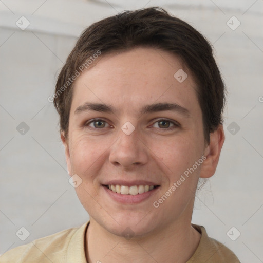 Joyful white young-adult female with short  brown hair and grey eyes