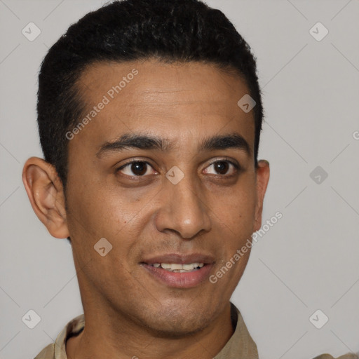 Joyful latino young-adult male with short  black hair and brown eyes