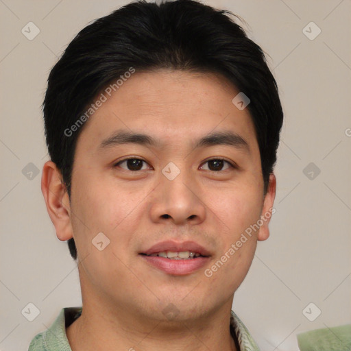 Joyful asian young-adult male with short  brown hair and brown eyes