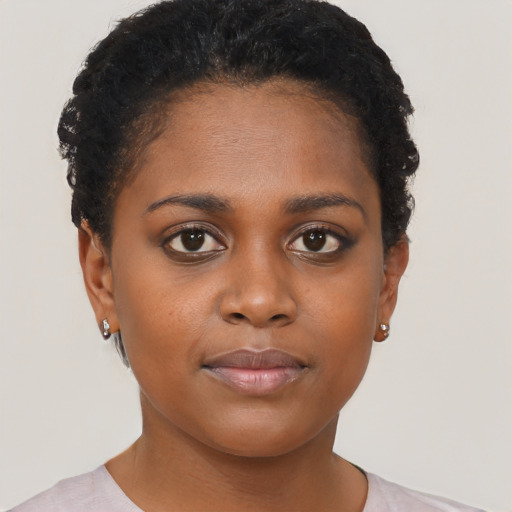 Neutral black young-adult female with short  brown hair and brown eyes