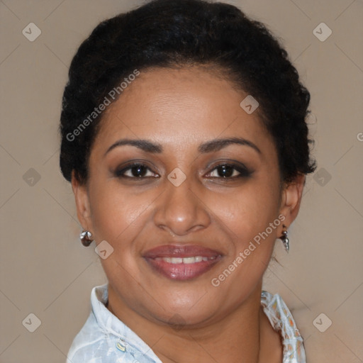 Joyful latino adult female with short  brown hair and brown eyes